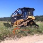2004 Caterpillar 517 Swing Boom Skidder